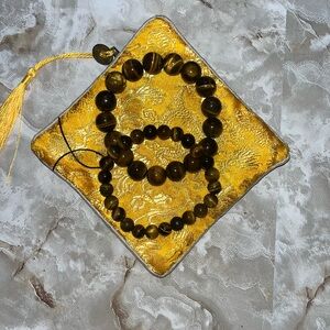 Tiger's Eye Beaded Bracelet Set on Gold Pouch